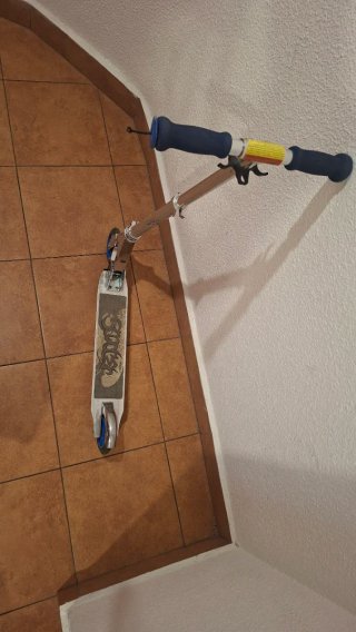 Patinete plegable plateado