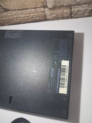 Lote PlayStation 2 Negra con Juegos
