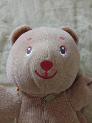 Mochila infantil oso peluche naranja