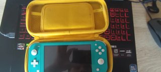 Switch Lite* Azul (Con sorpresa) + funda + sd 128g