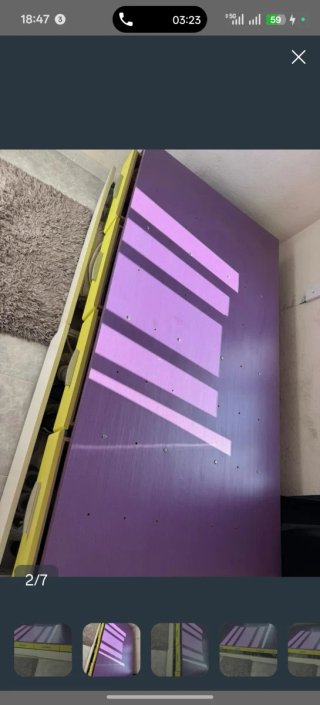 Cama de madera con cajones