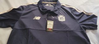 Polo New Balance Azul. Talla XL