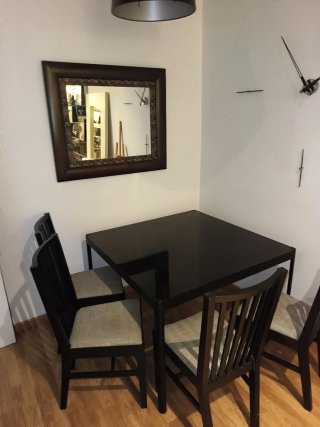 Mesa comedor cristal negro y 4 sillas