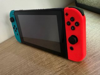 Nintendo Switch Azul y Rojo Completa