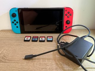 Nintendo Switch Azul y Rojo Completa