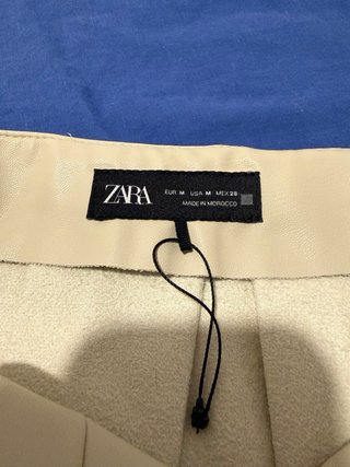 Falda beige plisada talla única