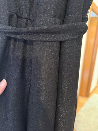 Mono negro con brillantina
