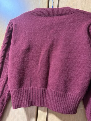 Jersey burdeos trenzado cuello pico