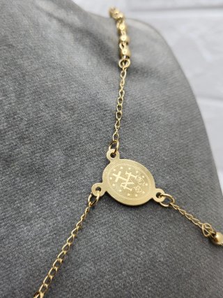Rosario Camarón de la Isla acero chapado oro
