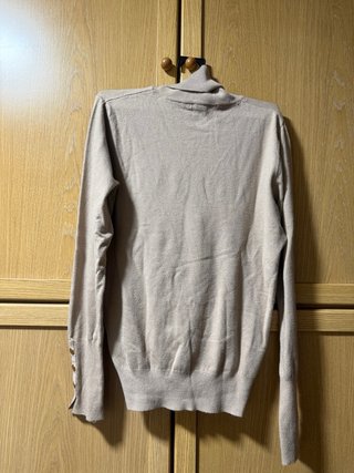 Jersey cuello alto beige
