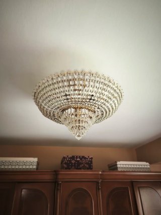 Lámpara araña de cristal y metal dorado
