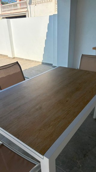 Mesa extensible jardín + 4 sillas + butaca