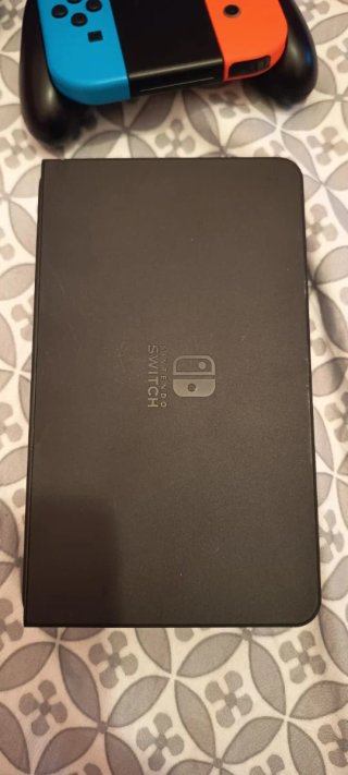 Nintendo Switch OLED 64+64gb (con extras)