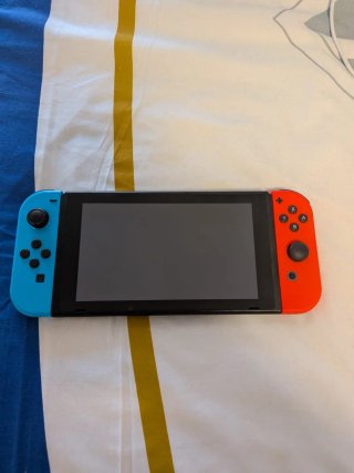 Nintendo Switch V1 + juegos y accesorios