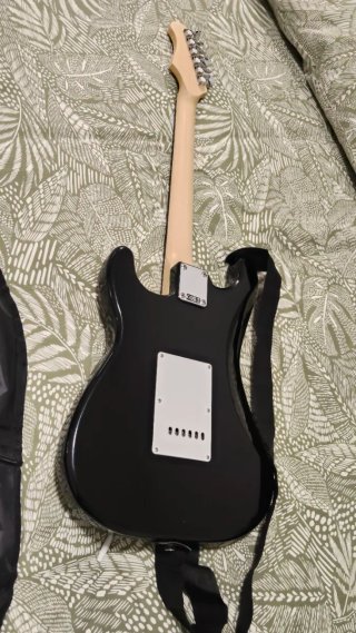Guitarra Eléctrica Rock con amplificador
