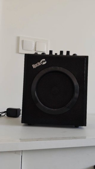 Guitarra Eléctrica Rock con amplificador