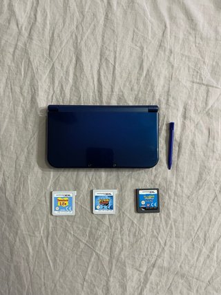 New nintendo 3DS XL color azul y juegos