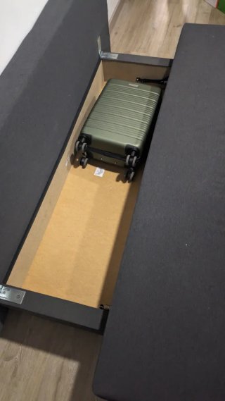 Sofá cama gris con almacenaje