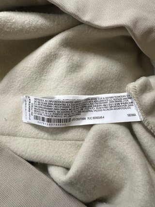 Sudadera Zara beige talla M con estampado azul