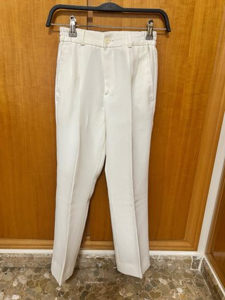 Traje de comunión niño blanco y azul.