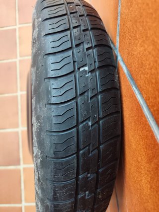 Rueda de repuesto galleta T155/80R17 Hankook.