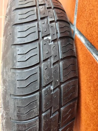 Rueda de repuesto galleta T155/80R17 Hankook.
