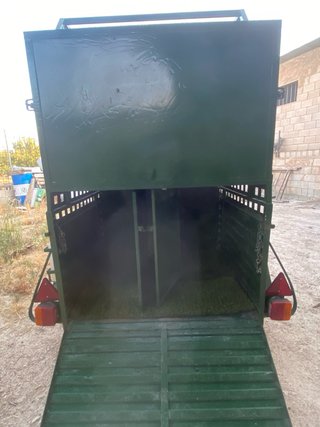 Remolque para perros verde