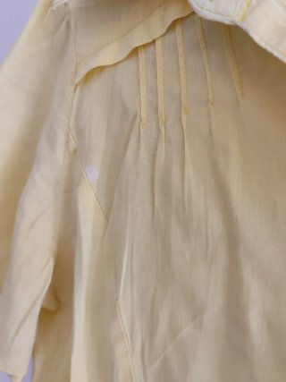 Blusa amarilla pastel manga corta talla L