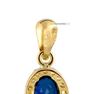 colgante oro 18k con piedra con zafiro