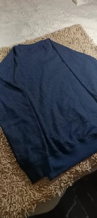 Sudadera Nike azul con logo rosa