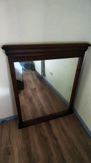 Espejo de madera tallada