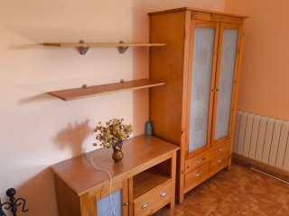 Mueble de salón madera y cristal