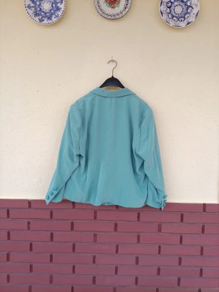 Americana azul hecha a mano