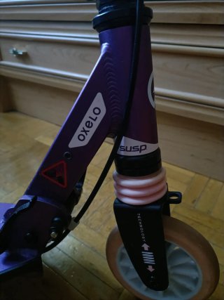 Patinete Oxelo morado con freno de pie y mano