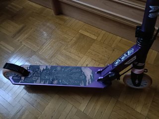 Patinete Oxelo morado con freno de pie y mano