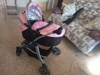 Carrito de muñecas rosa y negro