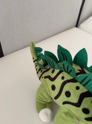 Peluche dinosauro verde