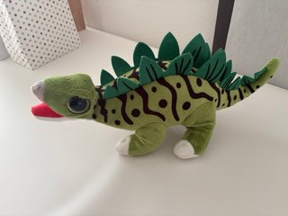Peluche dinosauro verde