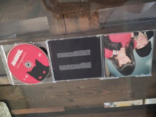 CD Amaral - Gato Negro, Dragón Rojo