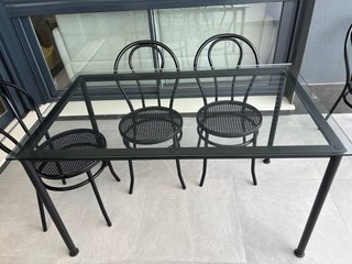 Mesa cristal y 6 sillas negras