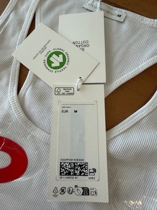 Body Stella McCartney x H&M bianco con scritta