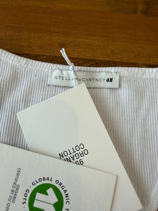 Body Stella McCartney x H&M bianco con scritta