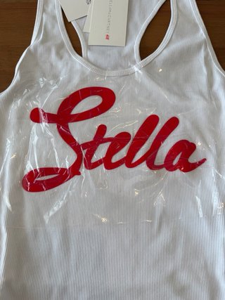 Body Stella McCartney x H&M bianco con scritta