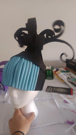 Peluca goma 3va negra y morada