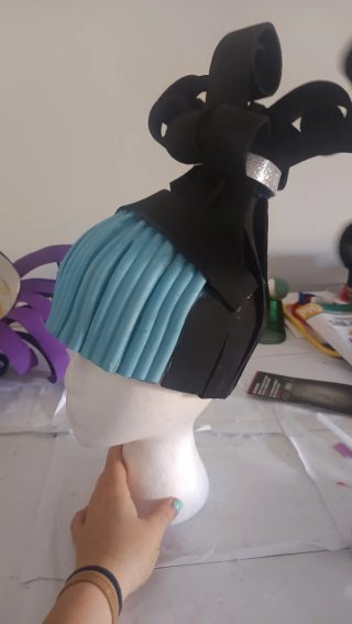 Peluca goma 3va negra y morada