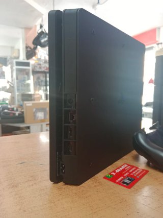 CONSOLA SONY PS4 SLIM 1TB 12.00 CON MANDO Y CABLES