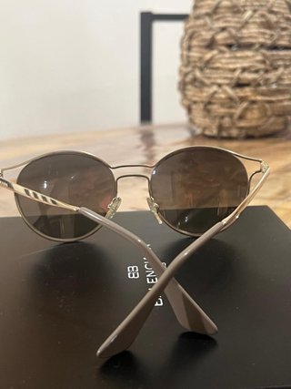 Gafas de sol Prada doradas y marrones
