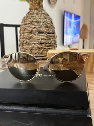 Gafas de sol Prada doradas y marrones