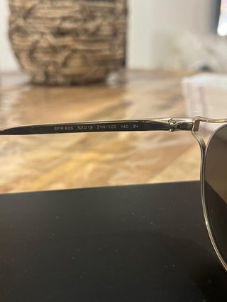 Gafas de sol Prada doradas y marrones