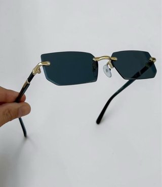 Occhiali da sole neri e oro